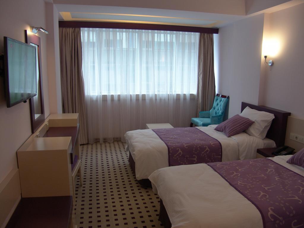 Izan Hotel Измир Номер фото