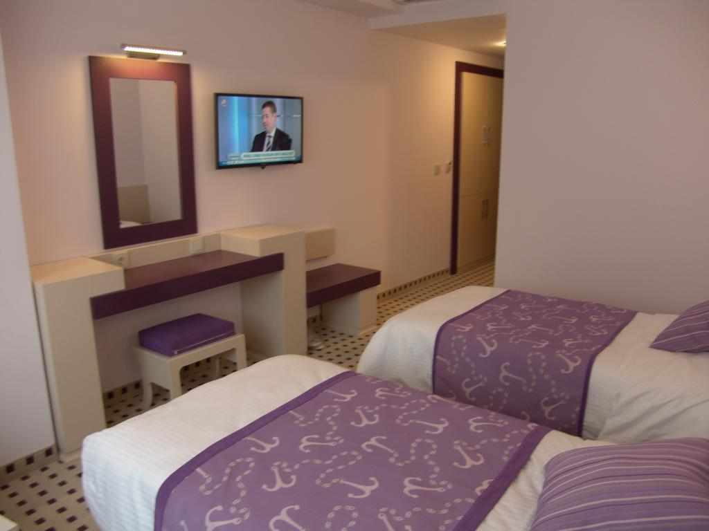 Izan Hotel Измир Номер фото