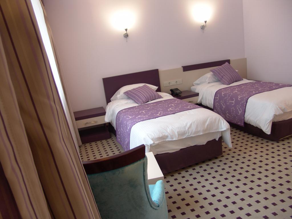 Izan Hotel Измир Номер фото