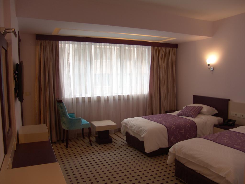 Izan Hotel Измир Номер фото