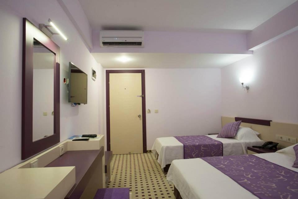 Izan Hotel Измир Номер фото